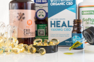 A table topped with lots of cbd products.