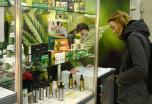 A woman looking at products on display in a store.